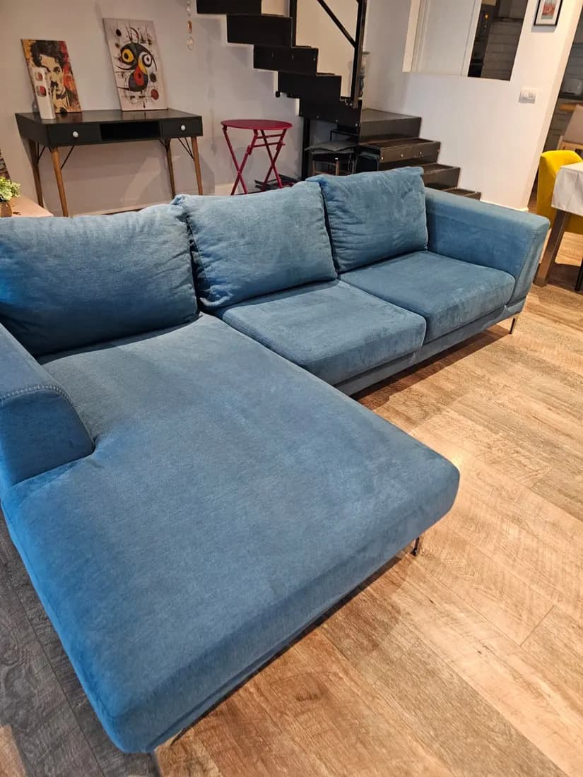 Blue fabric chaise sofa cleaned on-site in Malta by ARA Clean
