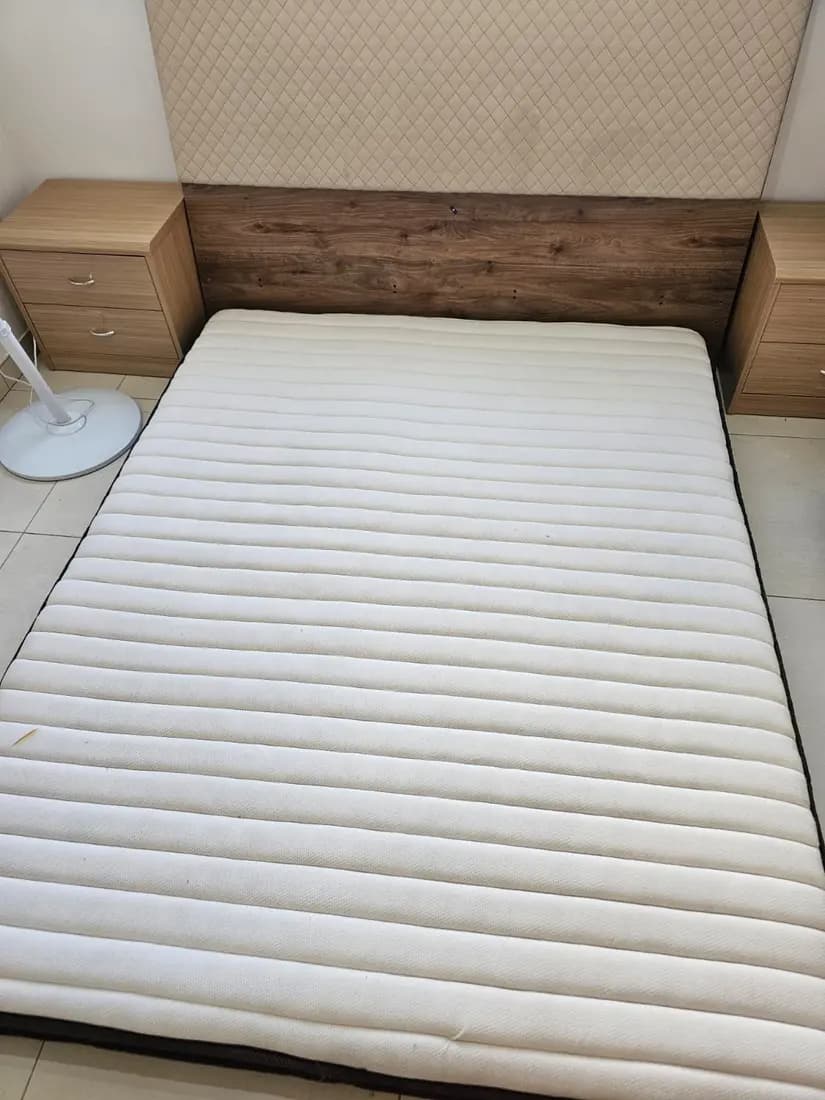 yellowed double mattress after professional cleaning by ARA Clean Malta