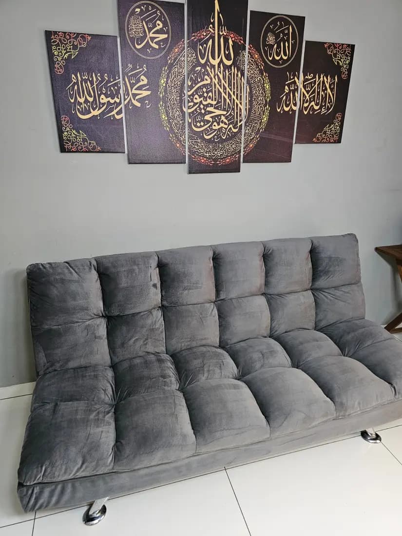 grey velvet sofa bed after professional cleaning by ARA Clean Malta
