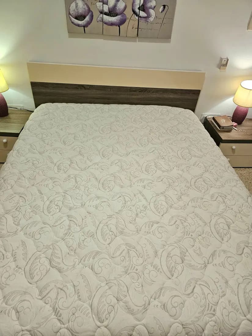 quilted mattress with a large stain after professional cleaning by ARA Clean Malta