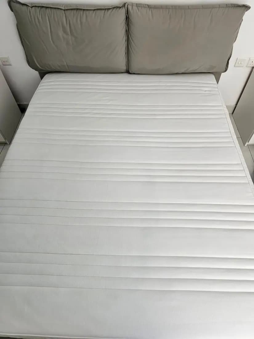 double mattress on an upholstered bed after professional cleaning by ARA Clean Malta