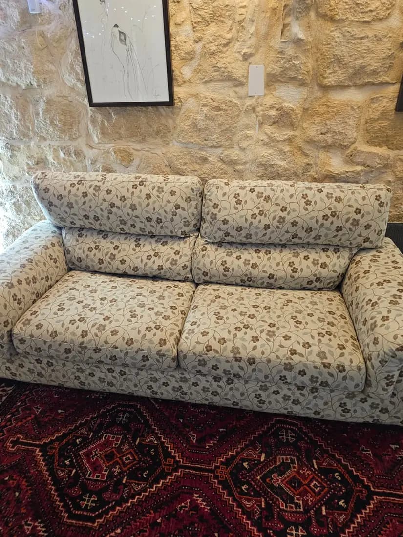 floral fabric sofa after professional cleaning by ARA Clean Malta