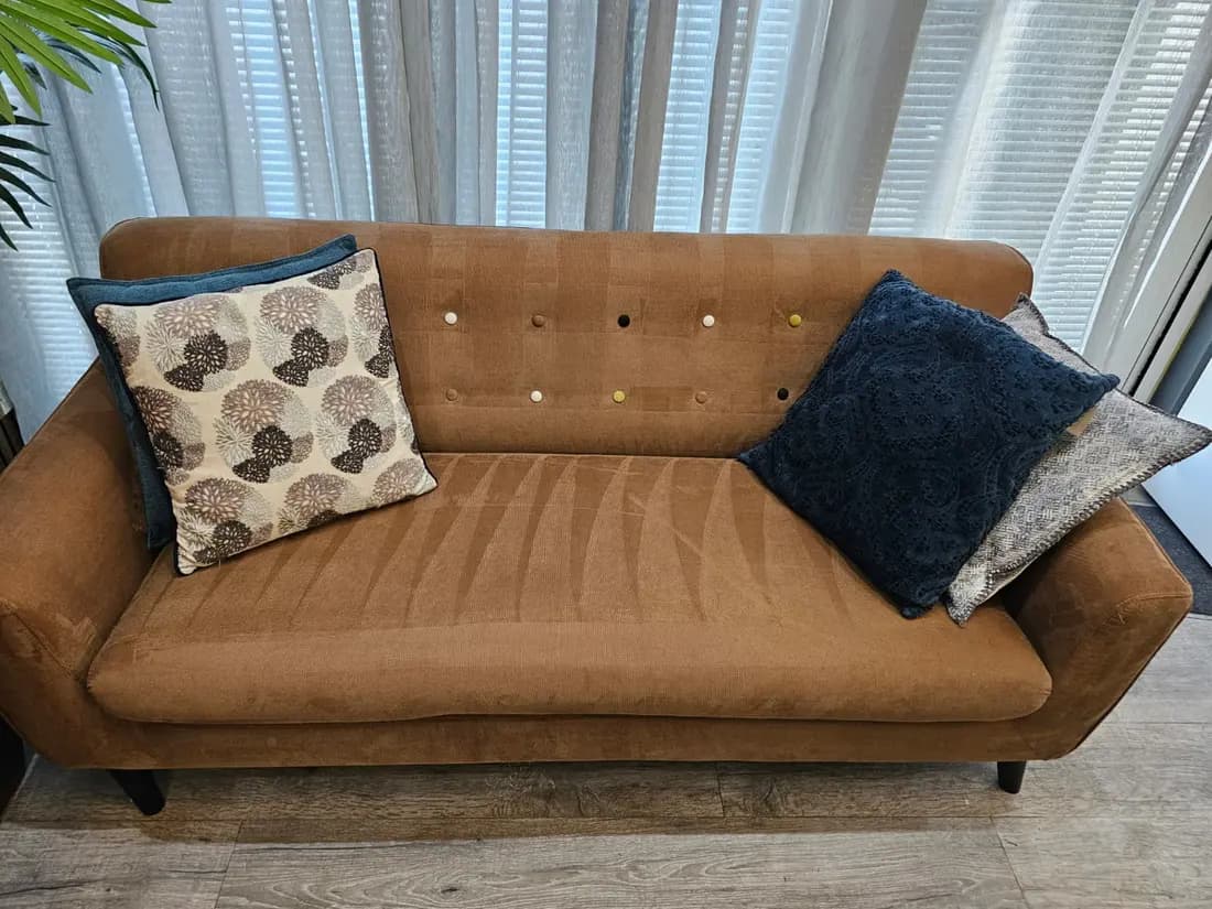 tan fabric sofa after professional cleaning by ARA Clean Malta