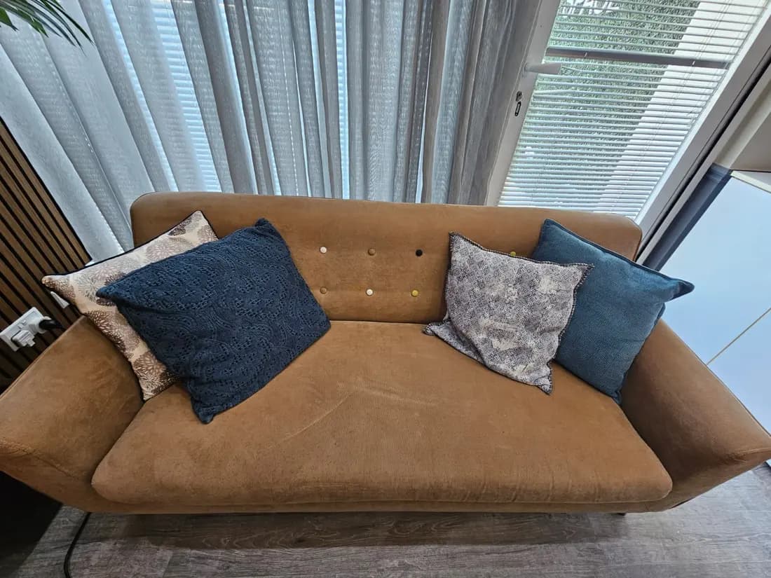 tan fabric sofa before cleaning by ARA Clean Malta